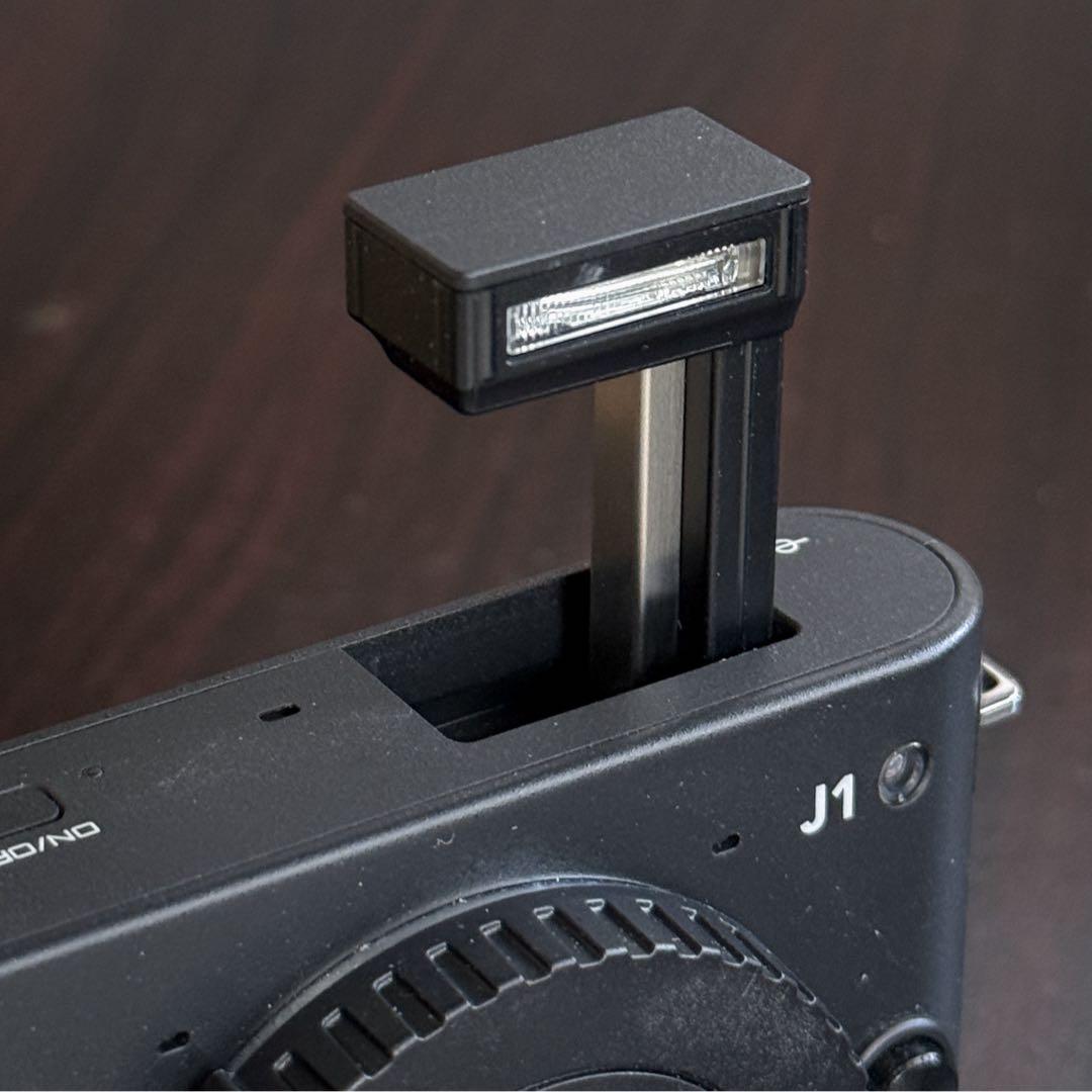Nikon J1 小難