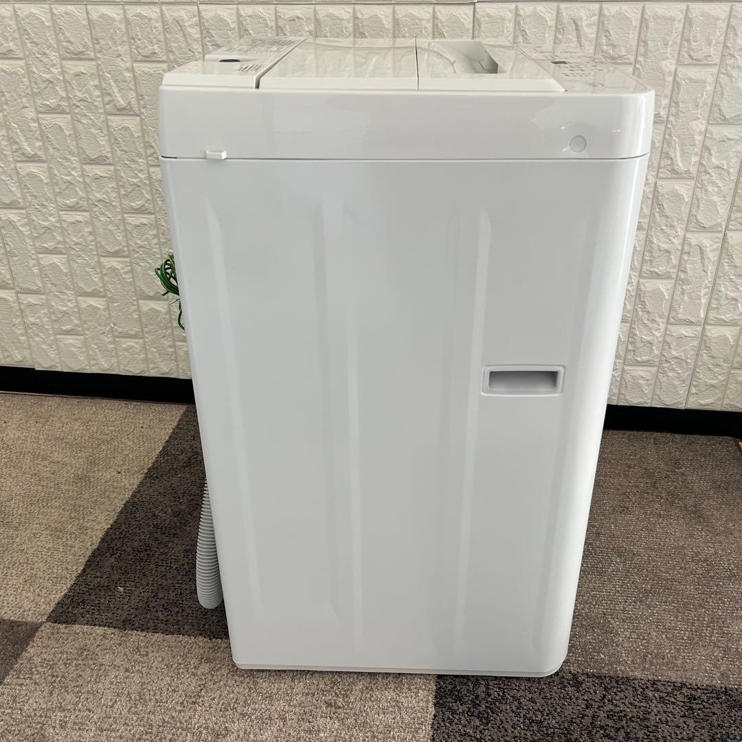 こ
